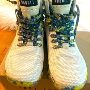 Lightly worn floral NoBull high top trainers